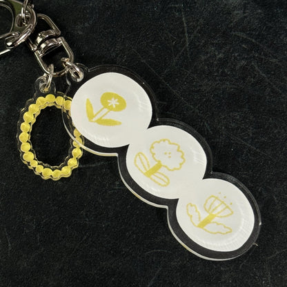 Rhythm of Circles Acrylic Keyring by Avocado Mori